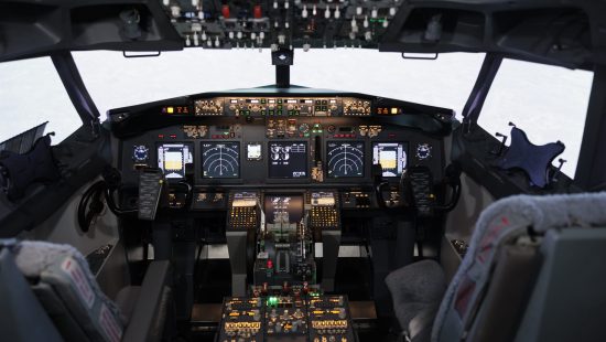 Empty airplane cockpit with electronic flying navigation panel, control command with buttons and lever on dashboard. No people in aircraft cabin to throttle engine and takeoff.